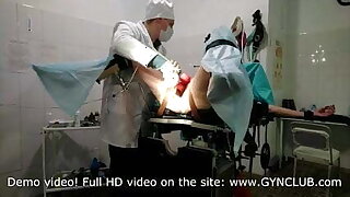 Two orgasms of a mature woman elbow the gynecologist